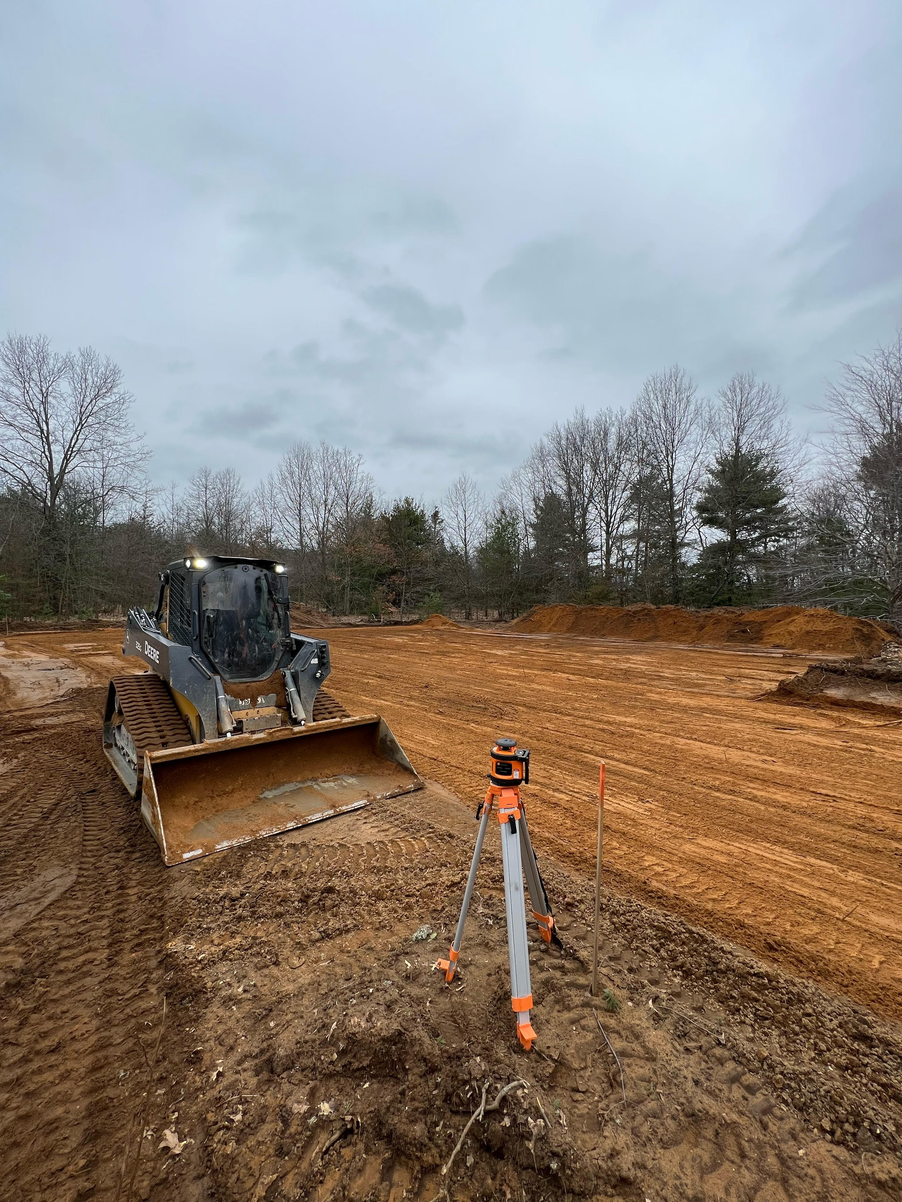 Skid steer next to leveled ground